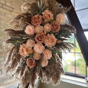Boho wedding arch floral arrangement